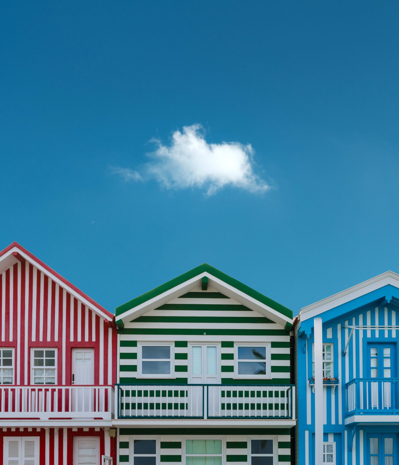colorfully striped beach houses real estate branding and rebranding 