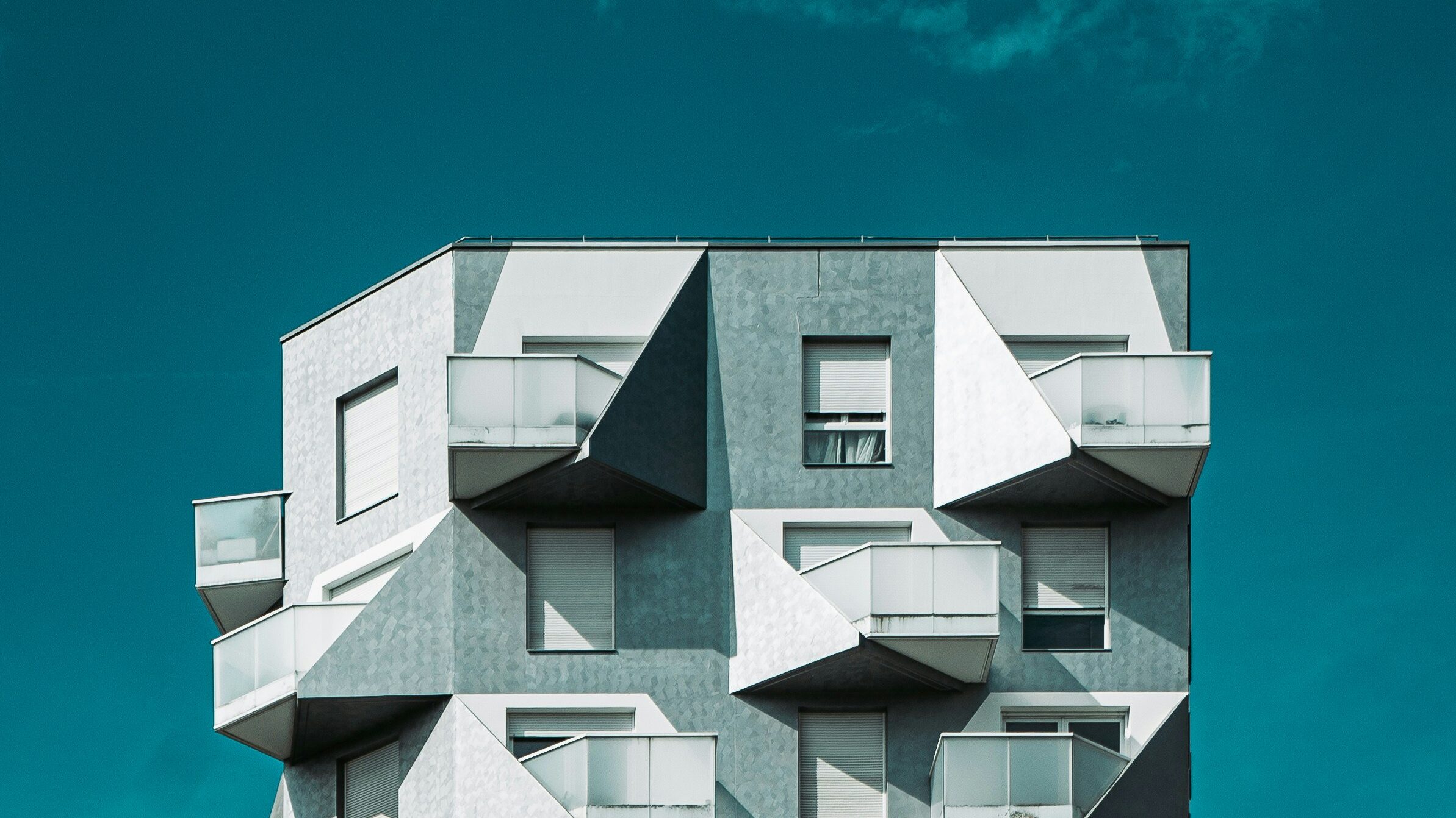 sfr property management abstract gray condo building geometrical on blue sky