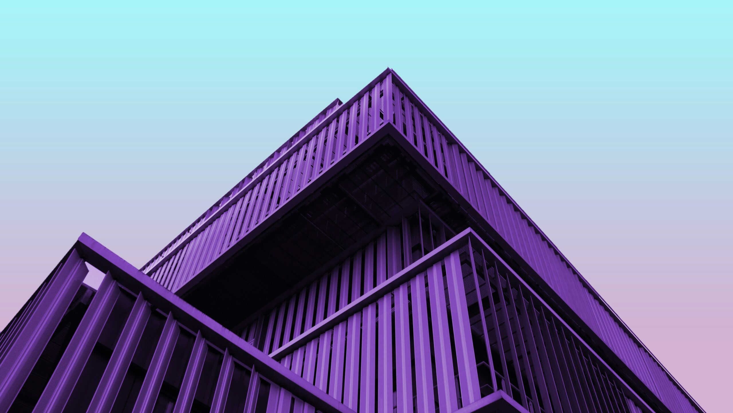 sfr property management purple condo building roof snapshot on blue sky